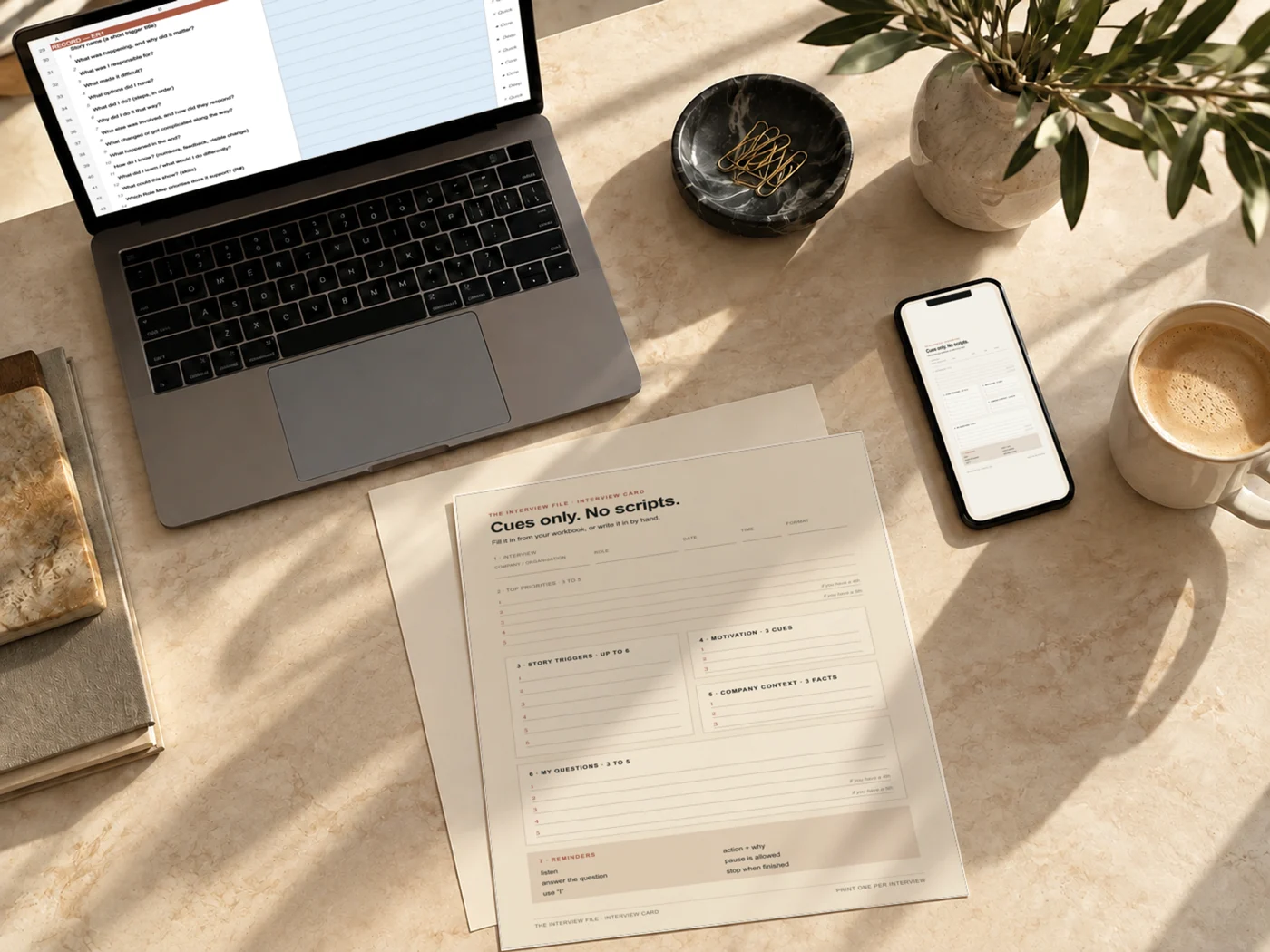 A calm morning preparation scene showing the real Interview Card and Workbook.